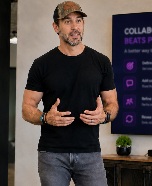 Craig speaking in front of a presentation screen